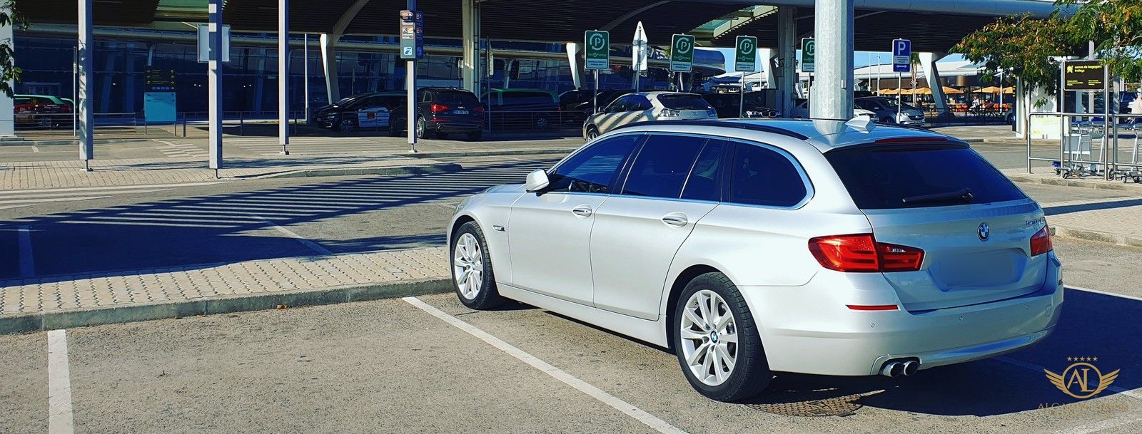 Algarve Limos BMW 525d Touring waiting at Faro Airport for a private transfer