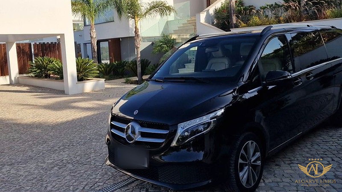 Algarve Limos® Mercedes V-Class waiting at a modern villa in the Algarve, chauffeur at your disposal