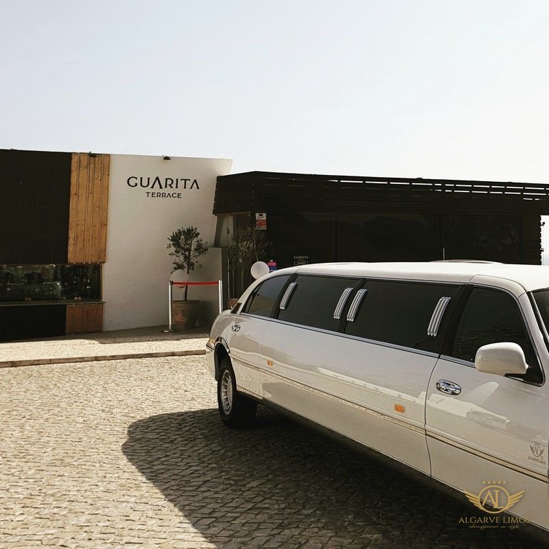 Algarve Limos stretch limousine outside a seaside restaurant for dinner