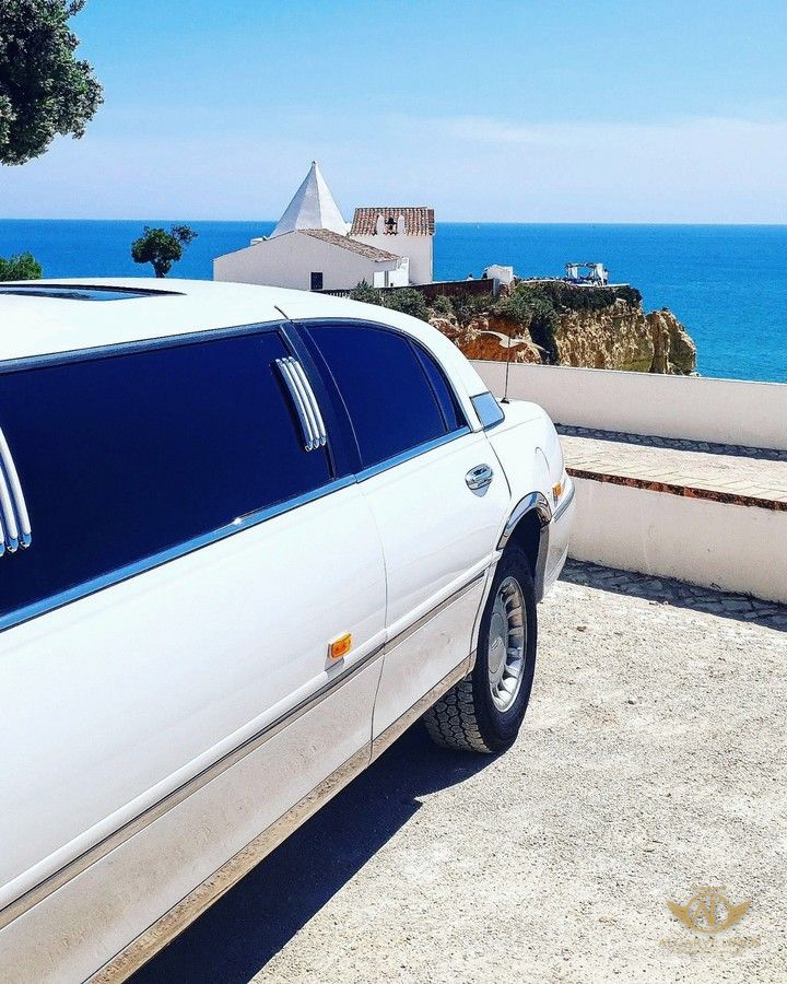 Algarve Limos stretch limousine above the sea by the chapel of Nossa Senhora da Rocha