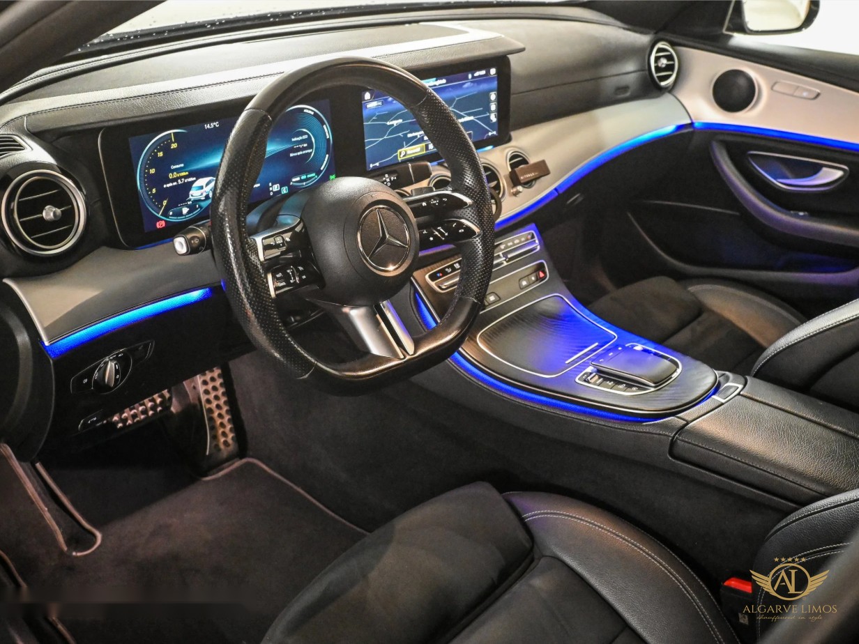 Algarve Limos Mercedes-Benz E-Class interior, driver's cockpit with ambient lighting