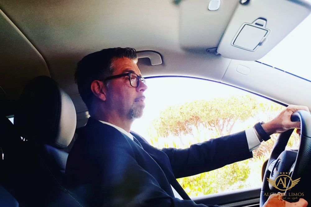 Algarve Limos private chauffeur driving a long-distance transfer