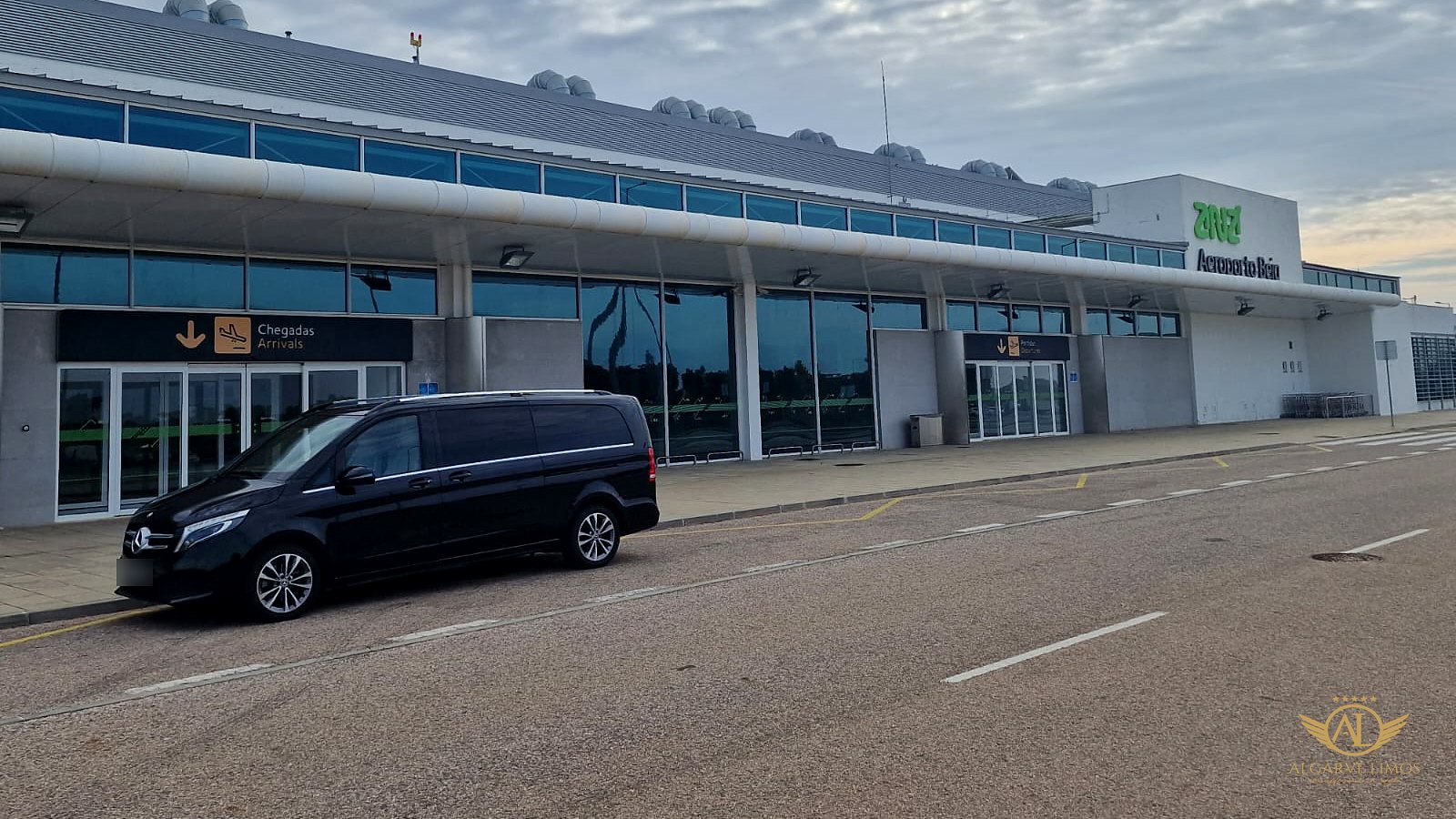 Algarve Limos® Mercedes V-Class waiting at the arrivals entrance of Beja Airport for a private jet arrival