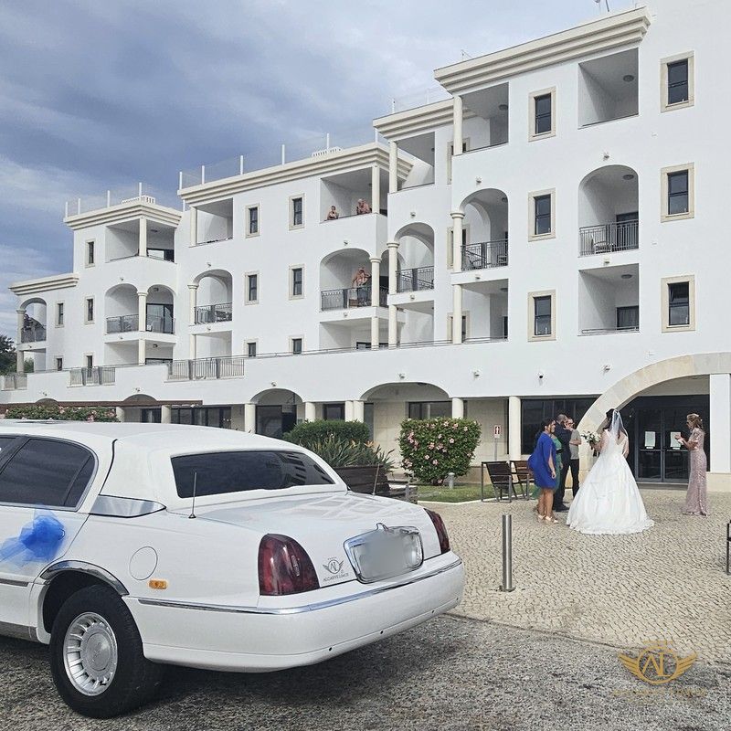 Bride arriving at a hotel wedding in the Algarve by Algarve Limos limousine
